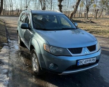 Серый Мицубиси Аутлендер, объемом двигателя 1.97 л и пробегом 229 тыс. км за 7300 $, фото 1 на Automoto.ua