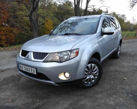 Серый Мицубиси Аутлендер, объемом двигателя 2.4 л и пробегом 300 тыс. км за 7600 $, фото 1 на Automoto.ua