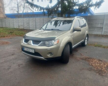 Серый Мицубиси Аутлендер, объемом двигателя 2 л и пробегом 245 тыс. км за 8600 $, фото 1 на Automoto.ua