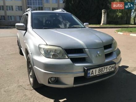 Мицубиси Аутлендер 2007 в Буче на Automoto.ua Серый Мицубиси Аутлендер, объемом двигателя 2.38 л и пробегом 182 тыс. км за 6000 $, фото 1 на Automoto.ua