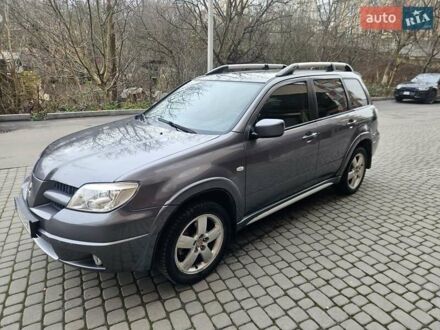 Сірий Міцубісі Аутлендер, об'ємом двигуна 2.38 л та пробігом 267 тис. км за 6300 $, фото 1 на Automoto.ua