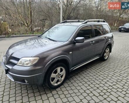 Сірий Міцубісі Аутлендер, об'ємом двигуна 2.38 л та пробігом 267 тис. км за 6300 $, фото 1 на Automoto.ua