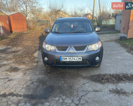 Серый Мицубиси Аутлендер, объемом двигателя 1.97 л и пробегом 257 тыс. км за 9000 $, фото 1 на Automoto.ua