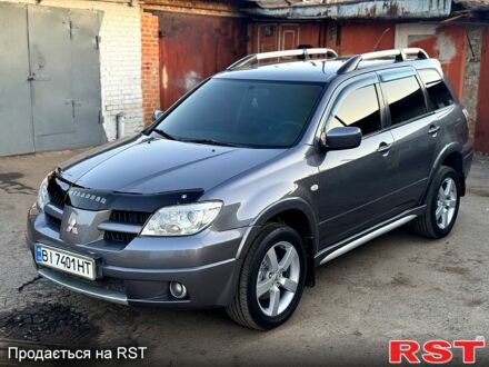 Мицубиси Аутлендер 2007 в Полтаве на Automoto.ua Серый Мицубиси Аутлендер, объемом двигателя 2.4 л и пробегом 260 тыс. км за 6900 $, фото 1 на Automoto.ua