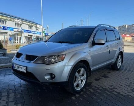 Серый Мицубиси Аутлендер, объемом двигателя 3 л и пробегом 252 тыс. км за 9300 $, фото 1 на Automoto.ua