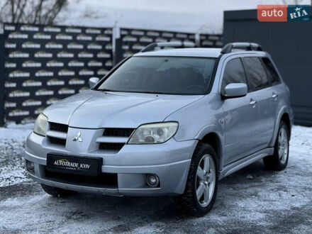 Сірий Міцубісі Аутлендер, об'ємом двигуна 2.4 л та пробігом 236 тис. км за 4950 $, фото 1 на Automoto.ua