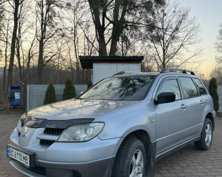 Серый Мицубиси Аутлендер, объемом двигателя 2 л и пробегом 415 тыс. км за 4699 $, фото 1 на Automoto.ua