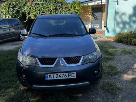 Серый Мицубиси Аутлендер, объемом двигателя 2 л и пробегом 286 тыс. км за 7200 $, фото 1 на Automoto.ua