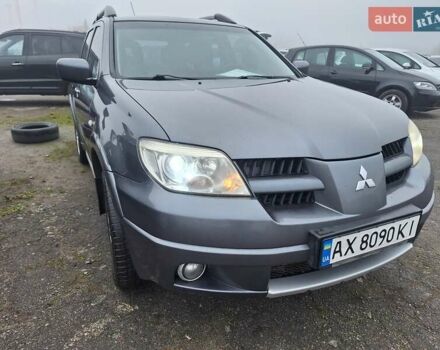 Сірий Міцубісі Аутлендер, об'ємом двигуна 2.38 л та пробігом 212 тис. км за 6999 $, фото 1 на Automoto.ua