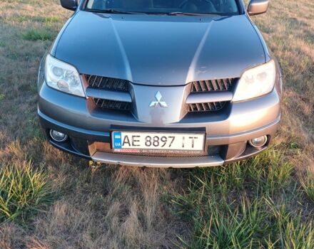 Сірий Міцубісі Аутлендер, об'ємом двигуна 2.4 л та пробігом 263 тис. км за 7200 $, фото 1 на Automoto.ua