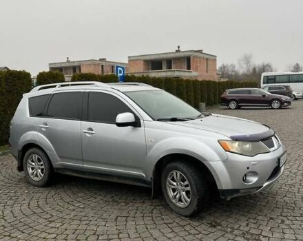 Серый Мицубиси Аутлендер, объемом двигателя 2.36 л и пробегом 285 тыс. км за 8500 $, фото 1 на Automoto.ua