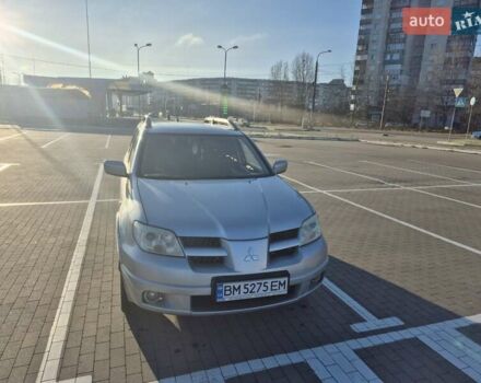 Сірий Міцубісі Аутлендер, об'ємом двигуна 2 л та пробігом 247 тис. км за 5600 $, фото 1 на Automoto.ua