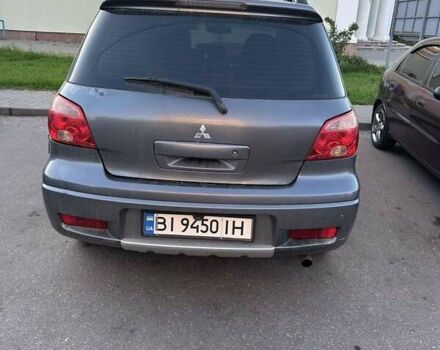 Сірий Міцубісі Аутлендер, об'ємом двигуна 2 л та пробігом 218 тис. км за 6100 $, фото 1 на Automoto.ua