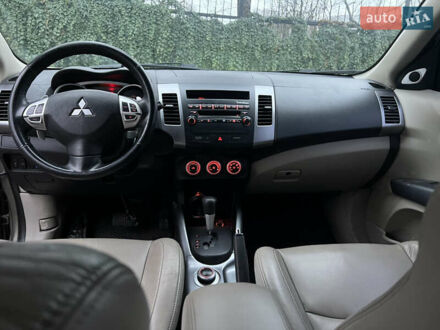 Сірий Міцубісі Аутлендер, об'ємом двигуна 2.4 л та пробігом 158 тис. км за 8600 $, фото 1 на Automoto.ua