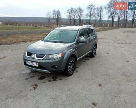 Серый Мицубиси Аутлендер, объемом двигателя 2 л и пробегом 230 тыс. км за 10200 $, фото 1 на Automoto.ua