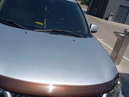 Сірий Міцубісі Аутлендер, об'ємом двигуна 2.4 л та пробігом 220 тис. км за 10200 $, фото 1 на Automoto.ua