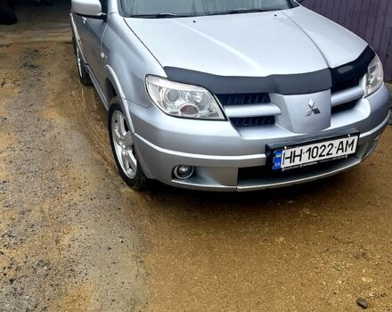 Серый Мицубиси Аутлендер, объемом двигателя 2 л и пробегом 19325 тыс. км за 6000 $, фото 1 на Automoto.ua