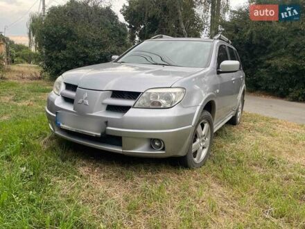 Мицубиси Аутлендер 2008 в Умани на Automoto.ua Серый Мицубиси Аутлендер, объемом двигателя 2.38 л и пробегом 209 тыс. км за 7460 $, фото 1 на Automoto.ua