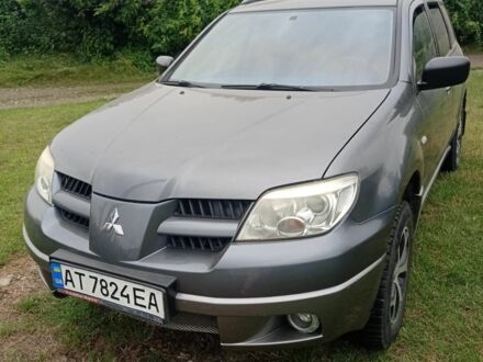 Сірий Міцубісі Аутлендер, об'ємом двигуна 2 л та пробігом 208 тис. км за 6000 $, фото 1 на Automoto.ua