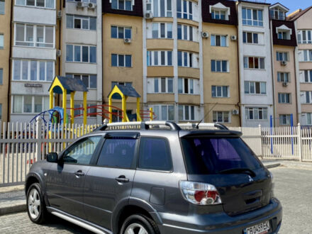 Сірий Міцубісі Аутлендер, об'ємом двигуна 2 л та пробігом 212 тис. км за 6850 $, фото 1 на Automoto.ua