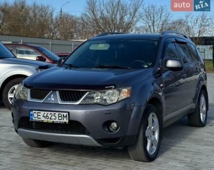 Серый Мицубиси Аутлендер, объемом двигателя 2.36 л и пробегом 215 тыс. км за 8000 $, фото 1 на Automoto.ua