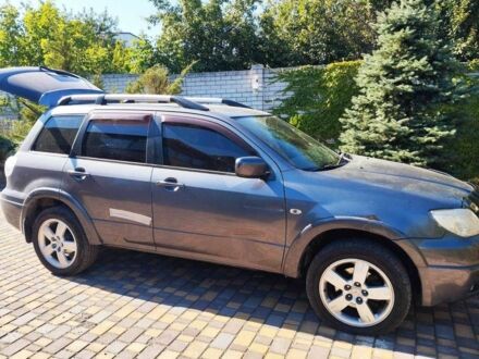 Мицубиси Аутлендер 2008 в Днепре (Днепропетровске) на Automoto.ua Серый Мицубиси Аутлендер, объемом двигателя 2.4 л и пробегом 250 тыс. км за 5000 $, фото 1 на Automoto.ua
