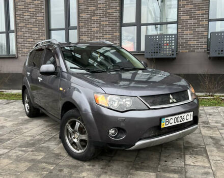 Серый Мицубиси Аутлендер, объемом двигателя 3 л и пробегом 182 тыс. км за 6299 $, фото 1 на Automoto.ua
