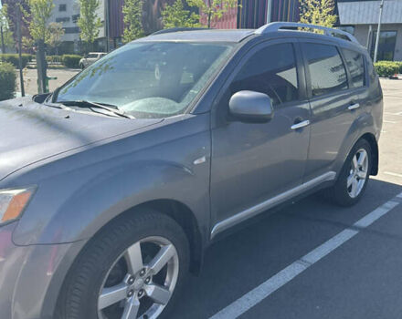Серый Мицубиси Аутлендер, объемом двигателя 2.4 л и пробегом 290 тыс. км за 9764 $, фото 1 на Automoto.ua