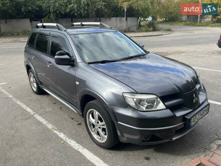 Сірий Міцубісі Аутлендер, об'ємом двигуна 2.38 л та пробігом 120 тис. км за 7200 $, фото 1 на Automoto.ua