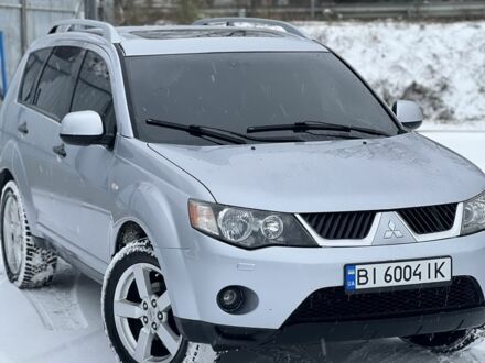 Сірий Міцубісі Аутлендер, об'ємом двигуна 2.4 л та пробігом 199 тис. км за 9900 $, фото 1 на Automoto.ua