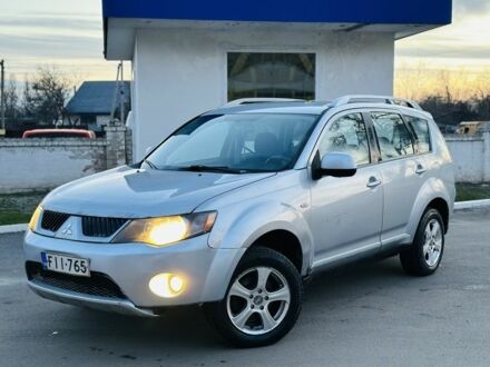 Серый Мицубиси Аутлендер, объемом двигателя 2 л и пробегом 260 тыс. км за 4350 $, фото 1 на Automoto.ua