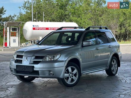 Міцубісі Аутлендер 2008 у Дніпро (Дніпропетровську) на Automoto.ua Сірий Міцубісі Аутлендер, об'ємом двигуна 2.4 л та пробігом 167 тис. км за 7599 $, фото 1 на Automoto.ua
