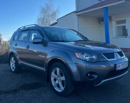 Серый Мицубиси Аутлендер, объемом двигателя 2.36 л и пробегом 214 тыс. км за 7800 $, фото 1 на Automoto.ua