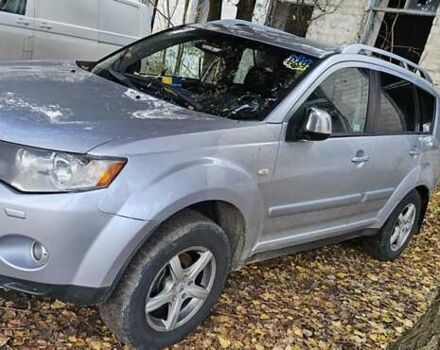 Серый Мицубиси Аутлендер, объемом двигателя 2.2 л и пробегом 280 тыс. км за 5300 $, фото 1 на Automoto.ua