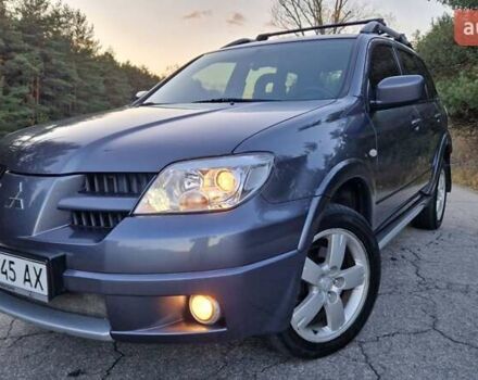Сірий Міцубісі Аутлендер, об'ємом двигуна 2 л та пробігом 157 тис. км за 8300 $, фото 1 на Automoto.ua