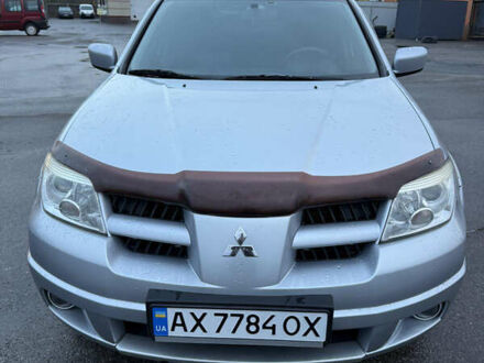 Сірий Міцубісі Аутлендер, об'ємом двигуна 2.4 л та пробігом 190 тис. км за 7500 $, фото 1 на Automoto.ua