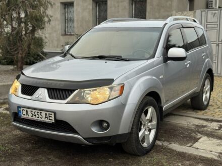 Серый Мицубиси Аутлендер, объемом двигателя 2.4 л и пробегом 241 тыс. км за 7350 $, фото 1 на Automoto.ua