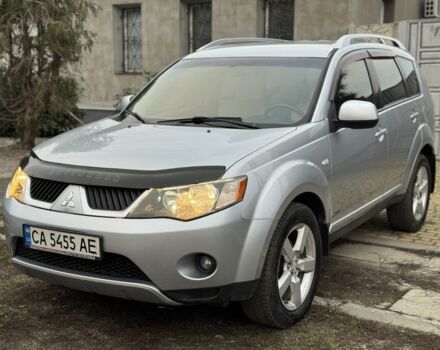 Серый Мицубиси Аутлендер, объемом двигателя 2.4 л и пробегом 241 тыс. км за 7350 $, фото 1 на Automoto.ua