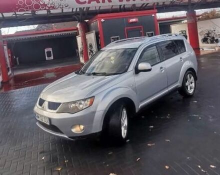 Серый Мицубиси Аутлендер, объемом двигателя 2 л и пробегом 340 тыс. км за 4321 $, фото 1 на Automoto.ua