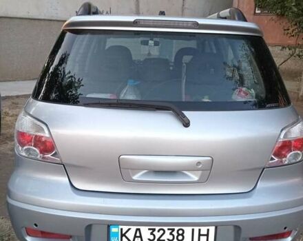 Сірий Міцубісі Аутлендер, об'ємом двигуна 2.38 л та пробігом 257 тис. км за 6000 $, фото 1 на Automoto.ua