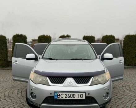 Серый Мицубиси Аутлендер, объемом двигателя 2.4 л и пробегом 285 тыс. км за 8500 $, фото 1 на Automoto.ua