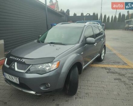 Серый Мицубиси Аутлендер, объемом двигателя 2.4 л и пробегом 290 тыс. км за 8000 $, фото 1 на Automoto.ua