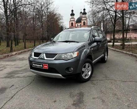 Серый Мицубиси Аутлендер, объемом двигателя 2.4 л и пробегом 237 тыс. км за 8490 $, фото 1 на Automoto.ua
