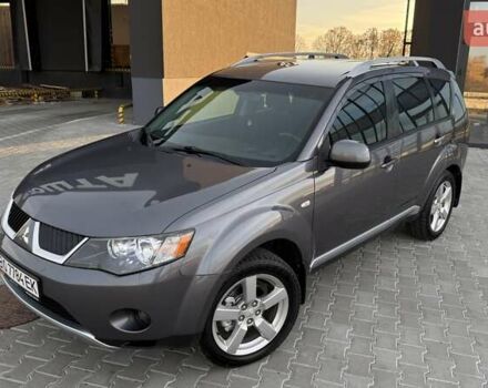 Серый Мицубиси Аутлендер, объемом двигателя 2.4 л и пробегом 174 тыс. км за 9599 $, фото 1 на Automoto.ua