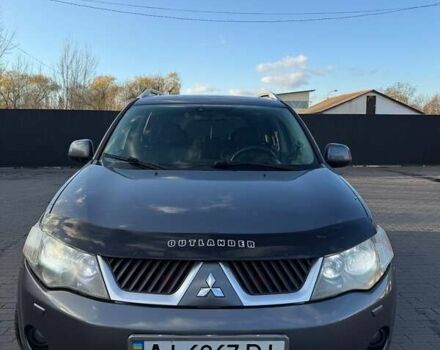 Серый Мицубиси Аутлендер, объемом двигателя 2.18 л и пробегом 287 тыс. км за 10200 $, фото 1 на Automoto.ua