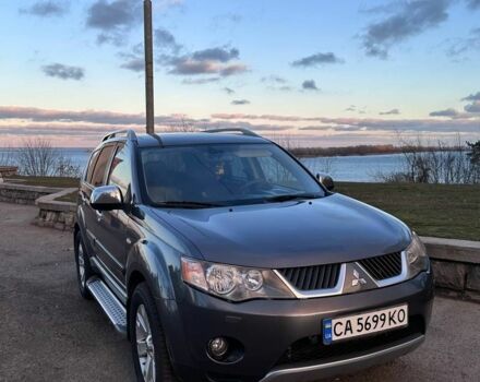 Сірий Міцубісі Аутлендер, об'ємом двигуна 2.4 л та пробігом 321 тис. км за 10000 $, фото 1 на Automoto.ua