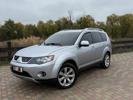 Серый Мицубиси Аутлендер, объемом двигателя 2 л и пробегом 280 тыс. км за 3900 $, фото 1 на Automoto.ua