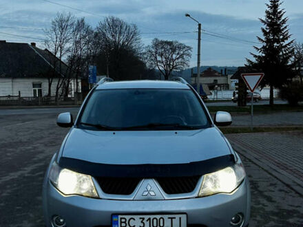 Сірий Міцубісі Аутлендер, об'ємом двигуна 2.4 л та пробігом 273 тис. км за 8400 $, фото 1 на Automoto.ua