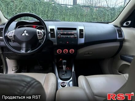 Сірий Міцубісі Аутлендер, об'ємом двигуна 2.4 л та пробігом 158 тис. км за 8550 $, фото 1 на Automoto.ua