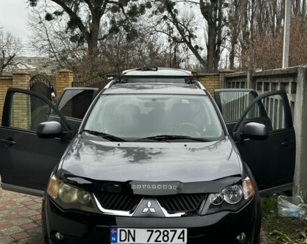 Серый Мицубиси Аутлендер, объемом двигателя 2.4 л и пробегом 265 тыс. км за 5500 $, фото 1 на Automoto.ua